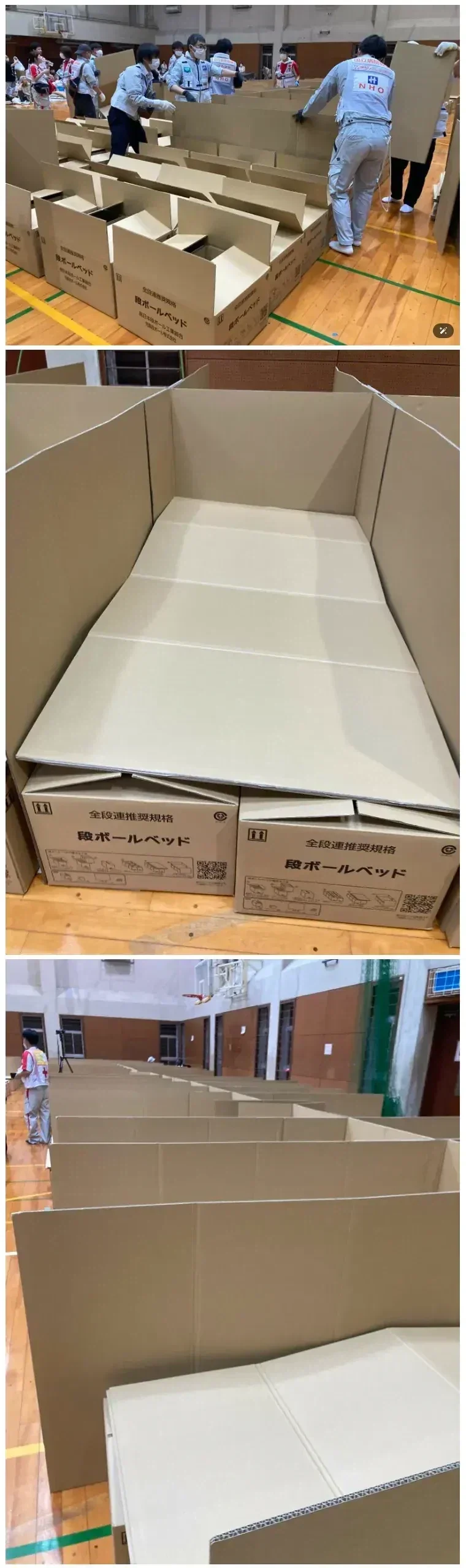 日本の避難所の体育館に段ボールベッドを組み立てる職員たち